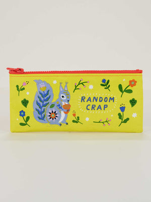 The Blue Q Random Crap Pencil Case is yellow with a red zipper, features a blue squirrel with an acorn amid flowers and leaves, and has "RANDOM CRAP" in white. Made from recycled material.