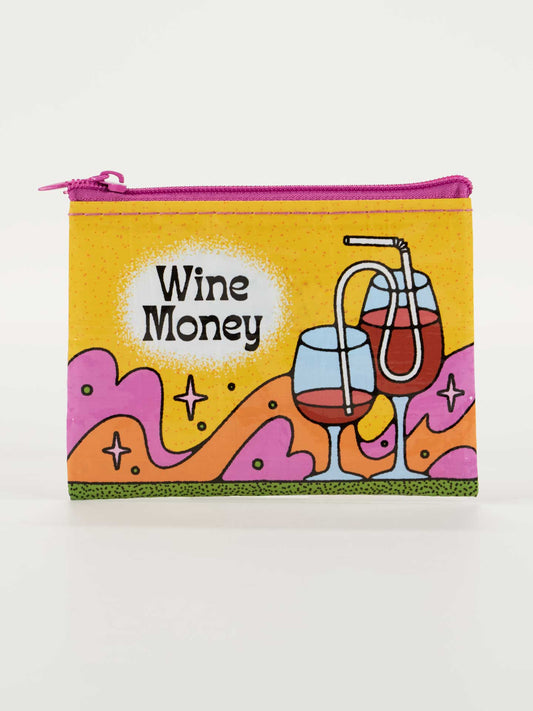 The Blue Q Wine Money Coin Purse is a small zippered pouch with a vibrant yellow and pink design, featuring two wine glasses, a playful wine straw, and "Wine Money" text—making it a fun accessory for any occasion.