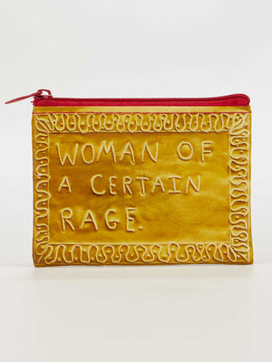 The Blue Q Woman Of A Certain Rage Coin Purse is a small, rectangular pouch made from recycled material, featuring a red zipper, "WOMAN OF A CERTAIN RAGE." embossed in the center, and a squiggly border design.