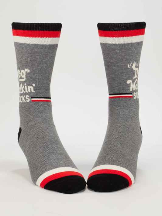 Blue Q's Dog Walkin' Men's Socks are gray cotton with red, white, and black stripes at the toes and tops, plus "Dog Walkin Socks" text in white on the sides.