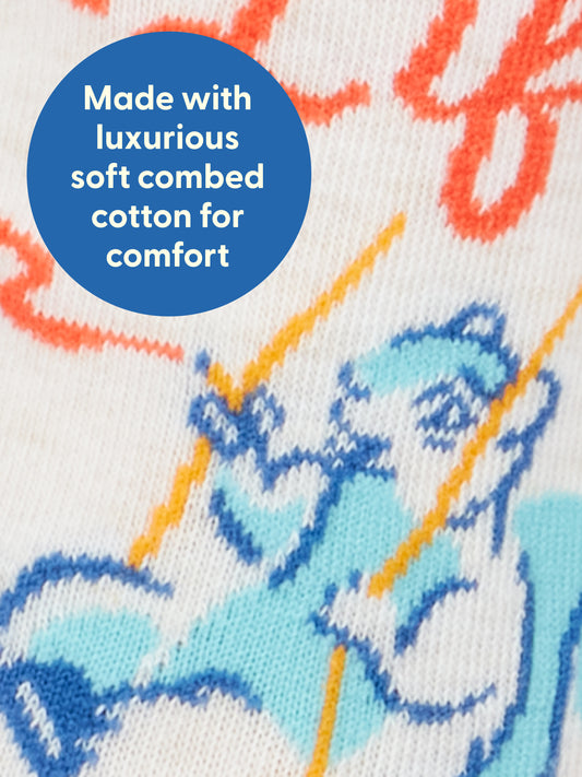 Close-up of fabric featuring a blue squirrel illustration with orange accents. A blue circle contains the text: "Made with luxurious soft combed cotton for comfort." Blue Q's High On Life...And Possibly Weed W-Crew Socks are perfect for women’s shoe sizes 5–10, offering both style and coziness in premium combed cotton.