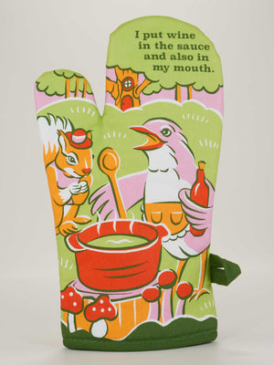 The Blue Q "I Put Wine In The Sauce And Also In My Mouth" Oven Mitt features vibrant cartoon art of a squirrel and a bird chef outdoors, with the bird holding a wine glass and delivering the witty phrase from the product name.