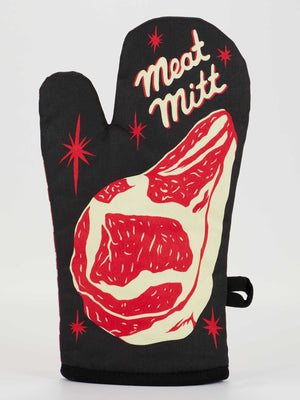 The Blue Q Meat Mitt Oven Mitt is a black, 100% cotton, super-insulated mitt with a red and white steak illustration, red starbursts, and “Meat Mitt” in cursive at the top for stylish kitchen protection.