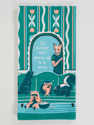 The "I'd Better Not Wake Up To A Mess Dish Towel" by Blue Q is a teal and white super-absorbent towel featuring a fox in a doorway and lounging animals, adding fun to cleanup.